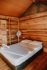 Postel nebo postele na pokoji v ubytování Hostal Casa Celeste + 37 fotografií