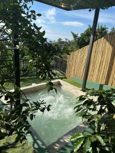 Bazén v ubytování Tahiti Casa Campestre nebo v jeho okolí