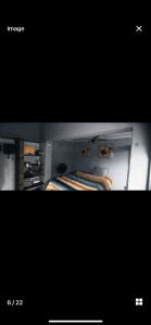 zwei Bilder von einem Schrank mit Krawatten darin. in der Unterkunft Cozy 1 bedroom cottage in Roodepoort