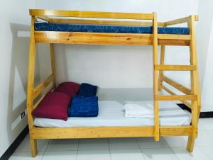 Postel nebo postele na pokoji v ubytování Marc&Rod Condo Type Hostel