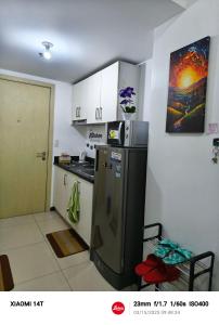 Kuchyň nebo kuchyňský kout v ubytování Condo UNIT-SM JAZZ RESIDENCES