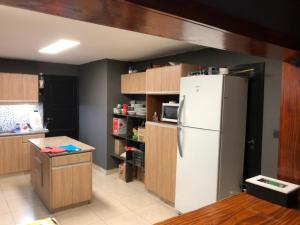 Køkken eller tekøkken på Olimpo Hostel + 3 billeder