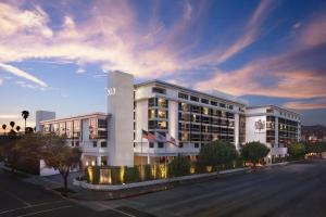 a large white building with a street in front of it at SLS Hotel, a Luxury Collection Hotel, Beverly Hills in Los Angeles