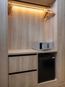 Una cocina o cocineta en Sercotel Delfos Andorra