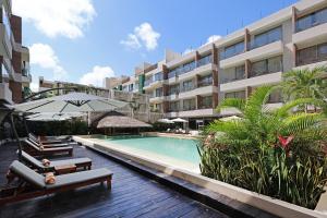 Bazén v ubytování Holiday Inn Tulum by IHG nebo v jeho okolí