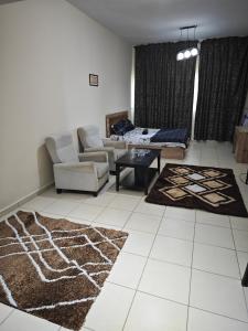 Posezení v ubytování Diamond studio Ajman one Towers