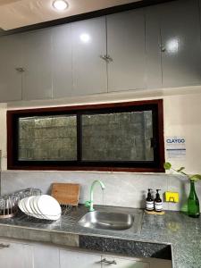 Kuchyň nebo kuchyňský kout v ubytování Mambajao Camiguin Homestay