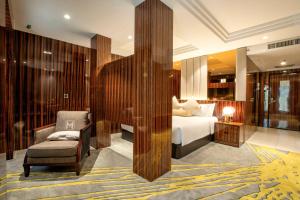 Postel nebo postele na pokoji v ubytování Moty Hotel