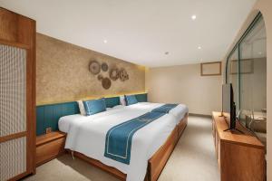 Letto o letti in una camera di Serenity Retreat
