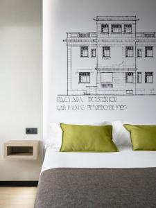 A bed or beds in a room at Sercotel Hotel Parque