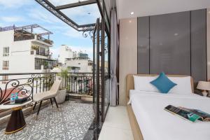 Balkón nebo terasa v ubytování Infinity HaNoi Hotel & Travel