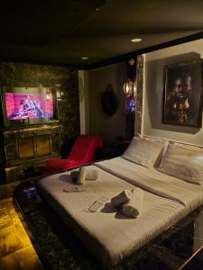 Katil atau katil-katil dalam bilik di KLC Apart Otel