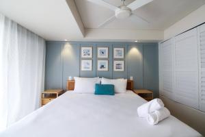 Ένα ή περισσότερα κρεβάτια σε δωμάτιο στο Beachfront escape in Coolangatta