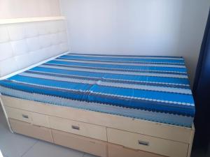 Postel nebo postele na pokoji v ubytování Sea Reaidence Tower E