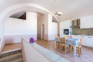 Kuchyň nebo kuchyňský kout v ubytování Tizzano House - La Marina