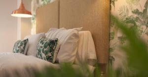 Łóżko lub łóżka w pokoju w obiekcie Suites You Zinc