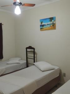 Ένα ή περισσότερα κρεβάτια σε δωμάτιο στο Hotel & Hostel San José