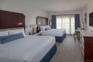 Cama ou camas em um quarto em Wyndham Grand Orlando Resort Bonnet Creek