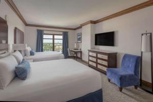 Cama ou camas em um quarto em Wyndham Grand Orlando Resort Bonnet Creek