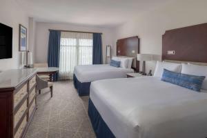 Cama ou camas em um quarto em Wyndham Grand Orlando Resort Bonnet Creek