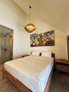 Ένα ή περισσότερα κρεβάτια σε δωμάτιο στο Cozy Nook Kuta Lombok +47 φωτογραφίες