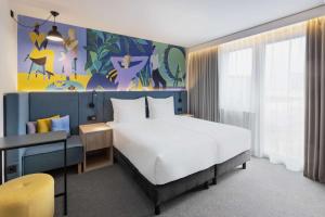 Postel nebo postele na pokoji v ubytování Spark by Hilton Vienna Messe Prater