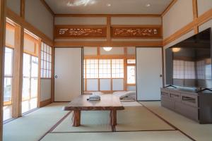 TV a/nebo společenská místnost v ubytování Mageme House JUN-CB0102