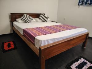 Postel nebo postele na pokoji v ubytování L3 Villa