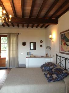 Voodi või voodid majutusasutuse La Locanda del Barbagianni toas