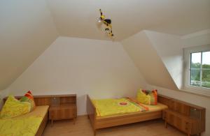Ein Bett oder Betten in einem Zimmer der Unterkunft Ferienhaus Krawulski