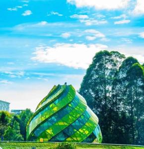 a rendering of a building with mountains in the background at HẢI ANH in Da Lat +12 photos