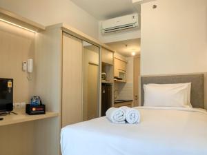 Imagen de la galería de Simply Studio at Tokyo Riverside PIK 2 Apartment By Travelio, en Rawalembang 10 fotos más