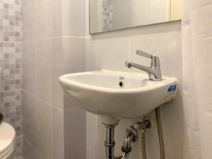 Imagen de la galería de Simply Studio at Tokyo Riverside PIK 2 Apartment By Travelio, en Rawalembang