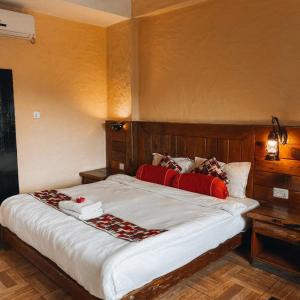 Ein Bett oder Betten in einem Zimmer der Unterkunft Hotel Tourist Residency
