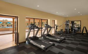 a gym with treadmills and elliptical machines at Storii By ITC Hotels, Jaisalmer in Jaisalmer