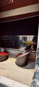 two metal bowls sitting on top of a counter at AeroNest - 3 BHK Apartment in Pune