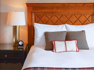 Postel nebo postele na pokoji v ubytování Fairmont Tremblant