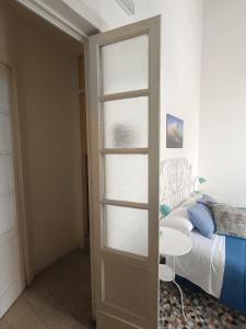 Posteľ alebo postele v izbe v ubytovaní B&B Perla