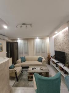 TV a/nebo společenská místnost v ubytování Nikolaj + 2 fotografie