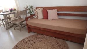 Postel nebo postele na pokoji v ubytování Apart Charme e Conforto 360m da Praia do Mutá