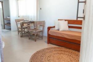 Postel nebo postele na pokoji v ubytování Apart Charme e Conforto 360m da Praia do Mutá