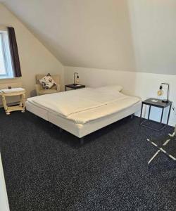 Postel nebo postele na pokoji v ubytování B&B Phønix