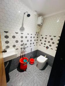 Koupelna v ubytování Hotel Pragati Inn