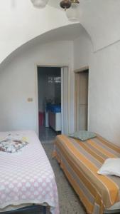 Postel nebo postele na pokoji v ubytování Sole mare monte 2