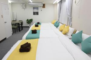 Letto o letti in una camera di LUANA in KOUENJI