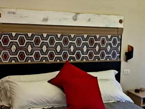 Postel nebo postele na pokoji v ubytování Agriturismo Violati