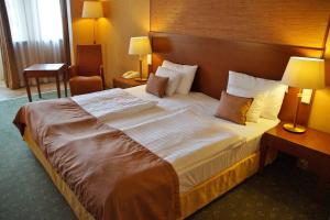 Кровать или кровати в номере Hotel und Restaurant Post Prienbach