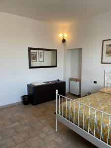 Postel nebo postele na pokoji v ubytování BeB cascina Mentirone