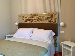 Postel nebo postele na pokoji v ubytování Agriturismo Violati