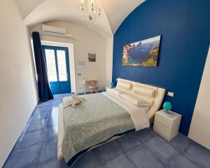 Ένα ή περισσότερα κρεβάτια σε δωμάτιο στο B&B SOGNANDO VIETRI e SPA ESCLUSIVA +68 φωτογραφίες